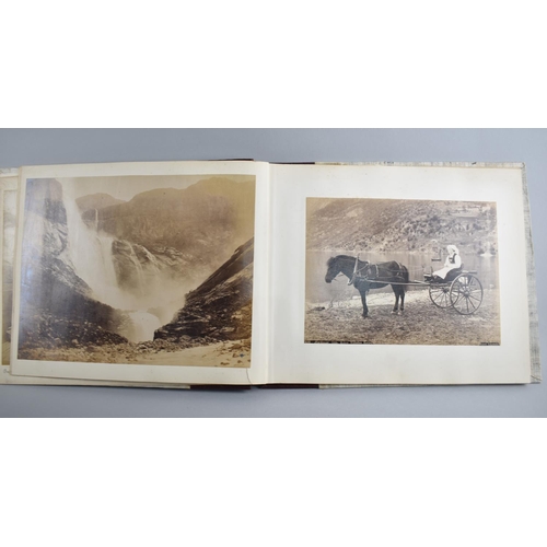 59 - A Late 19th century Photo Album Containing Monochrome and Hand Coloured Photographs of People and Pl... 