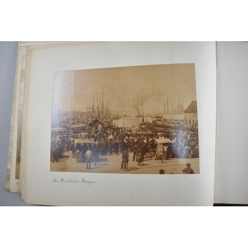 59 - A Late 19th century Photo Album Containing Monochrome and Hand Coloured Photographs of People and Pl... 