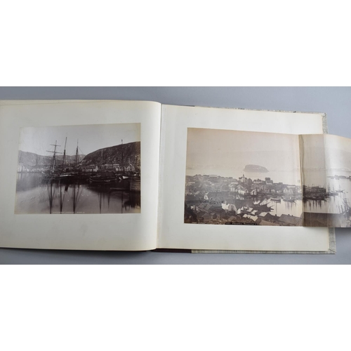 59 - A Late 19th century Photo Album Containing Monochrome and Hand Coloured Photographs of People and Pl... 