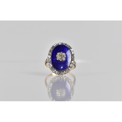 A 19th Century Diamond and Blue Enamel Dress Ring, Central Square Old Mine Cut Diamond Measuring Approx 4.6mm by 4.6mm, White Metal Collet and Claw Set on a Royal Blue Guilloche Enamel Panel Bordered with 28 Additional Old Mine Cut Diamonds, Collet Set in White Metal, Head measuring 22mm by 17mm Approx, Raised on a Tapered Band with Piped Detail to Shoulders, Unmarked, Testing as 18ct, Size M, 6.2gms