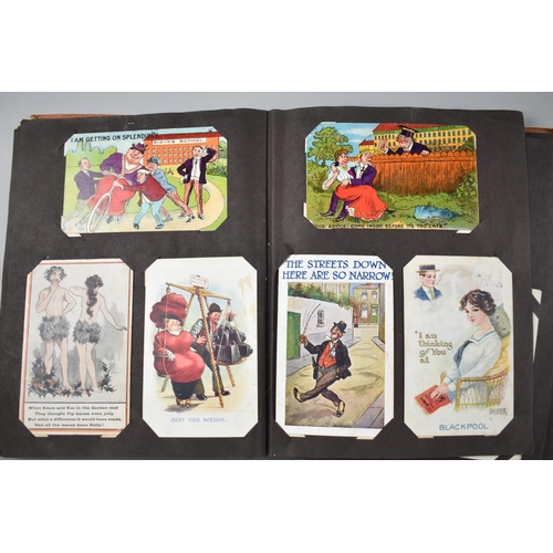 102 - A Vintage Postcard Album Containing Early 20th Century Humorous Postcards