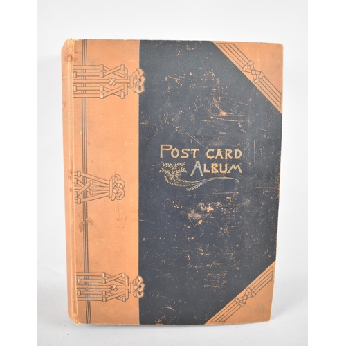 104 - An Early 20th Century Postcard Album Containing Coloured and Monochrome Scenic Postcards