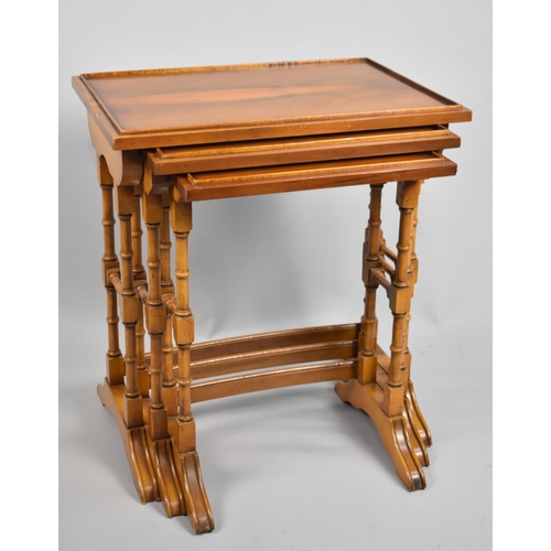 109 - A Late 20th Century Yew Wood Nest of Three Tables, 51cm wide