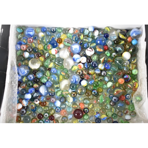 164 - A Collection of Various Sized Marbles