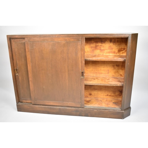 477 - A Narrow Edwardian Shelved Bookcase with Sliding Doors, 125cm wide