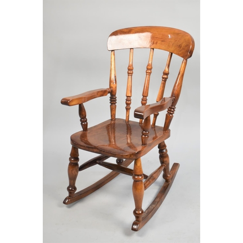 483 - A Mid 20th Century Child's Spindle Back Rocking Chair