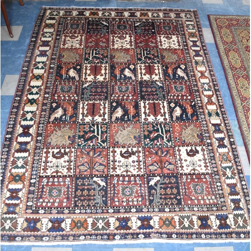 490 - A Patterned Woollen Carpet, 311x210cm