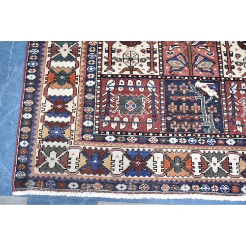 490 - A Patterned Woollen Carpet, 311x210cm