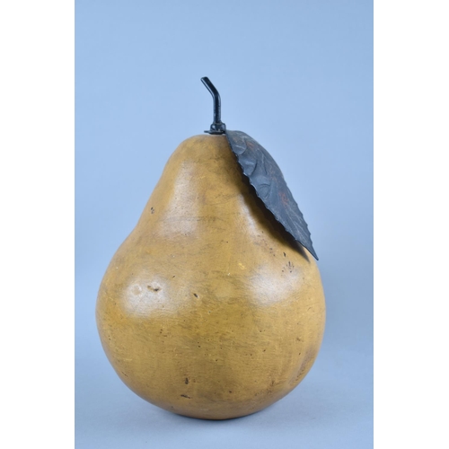 61 - A Large Glazed Terracotta Study of a Pear with Metal Leaf and Stalk, 24cms High