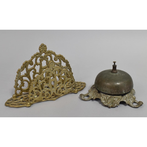 90 - A Pierced Brass Desk Top Letter Rack and a Counter Bell