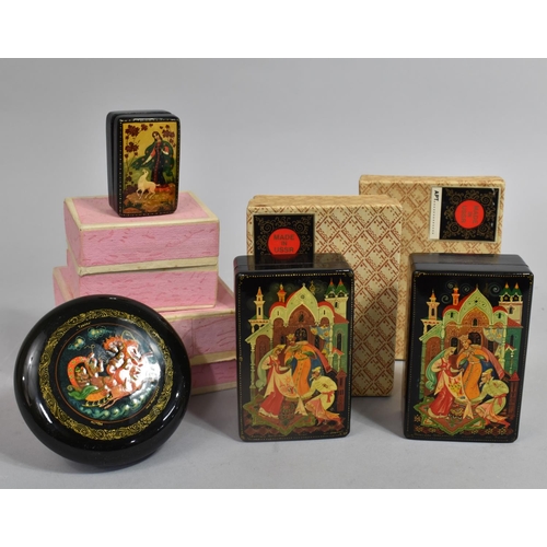 98 - A Collection of Four Russian Lacquered Boxes with Fairy Tale Decoration to Lids