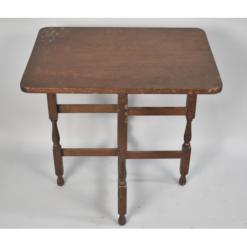 238 - A Mid 20th Century Folding Oak Table with Hinged Top, 61cm Wide