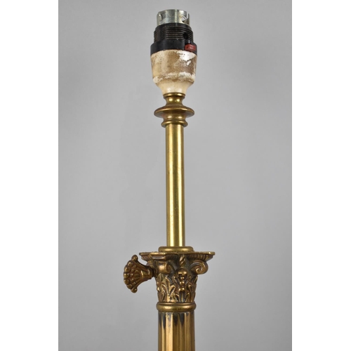 14 - An Edwardian Rise and Fall Brass Table Lamp in the Form of a Ribbed Corinthian Column on Stepped Squ... 