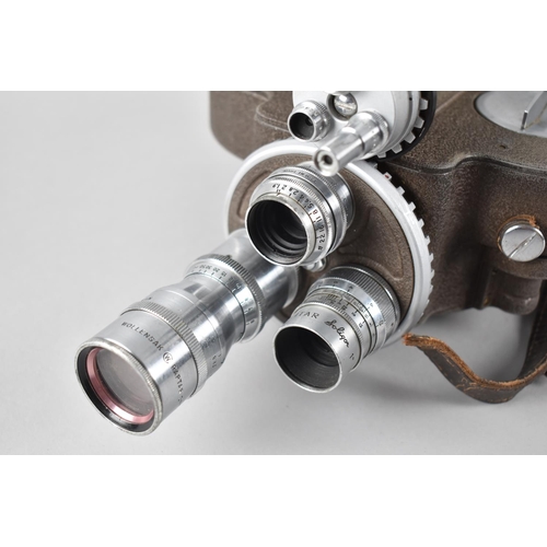 170 - A Vintage Clockwork 16mm Bell and Howell 70-DR Movie Camera with Three Lens to include Wallenssack R... 