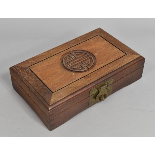 176 - An Oriental Wooden Jewellery Box together with a Tooled Leather Blotter having Islamic Decoration