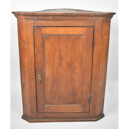 450 - A 19th Century Oak Corner Cabinet, 67cms Wide