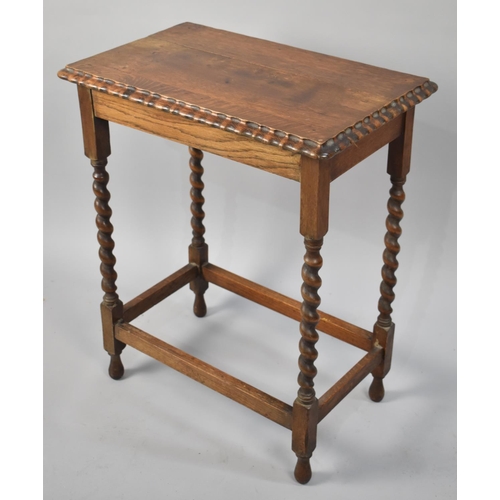 453 - An Edwardian Oak Rectangular Occasional Table with Barley Twist Supports, 60cms Wide