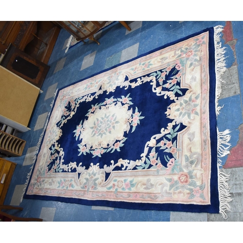 455 - A Rectangular Patterned Chinese Woollen Rug, 268x180cms