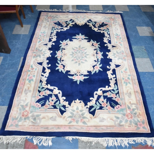 455 - A Rectangular Patterned Chinese Woollen Rug, 268x180cms