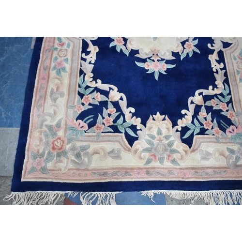 455 - A Rectangular Patterned Chinese Woollen Rug, 268x180cms