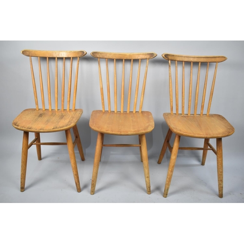 457 - A Set of Three Spindle Back Dining Chairs