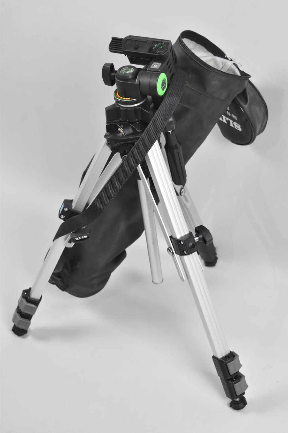 A Slik 88 Camera Tripod with Carrying Bag
