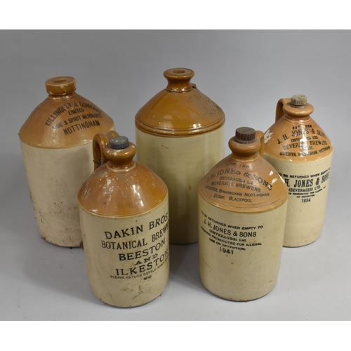 362 - A Collection of Various Glazed Stoneware Bottles to include Examples for JH Jones and Sons, Beverage... 