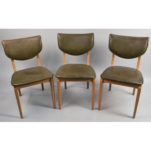 428 - Three  Vintage Leather Upholstered Chairs