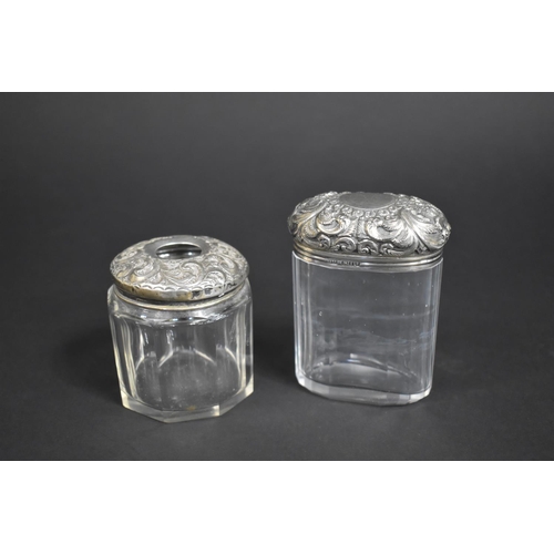 442 - Two Silver and Glass Dressing Table Pots, Both with Scrolled Decoration, 7.5cm and 9cm high