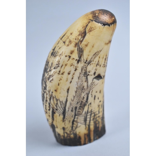 122 - A Resin Scrimshaw Whale Tooth, 12cms High