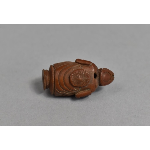 244 - A 19th Century Chinese Carved Hediao Nut in the Form of an Eldar and Attendant, 4cms High