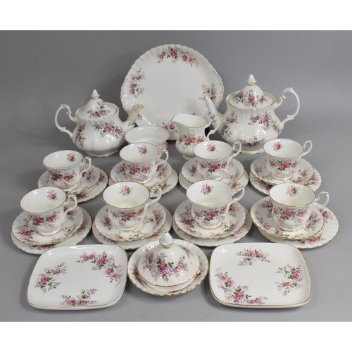 305 - A Royal Albert Lavender Rose Tea Service to comprise Two Teapots, Milk Jug, Sugar Bowl, Eight Cups a... 