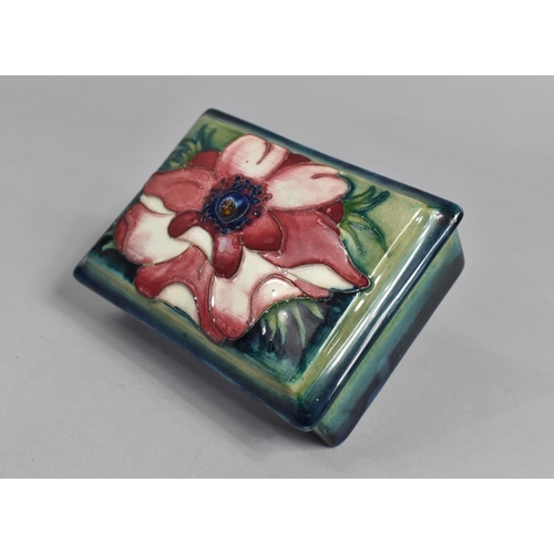 383 - A Moorcroft Lidded Box, Clematis Pattern on Blue Ground, 12cms Wide