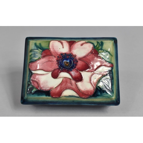 383 - A Moorcroft Lidded Box, Clematis Pattern on Blue Ground, 12cms Wide