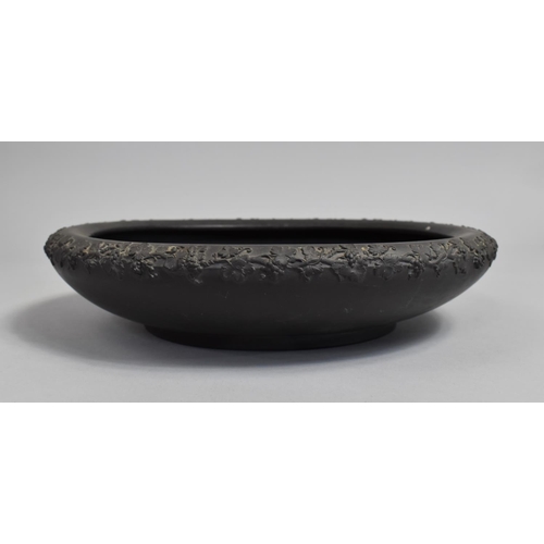 386 - A Wedgwood Basalt Bowl of Shallow Form, Decorated in Relief with Vine and Leaves, 30cms Diameter