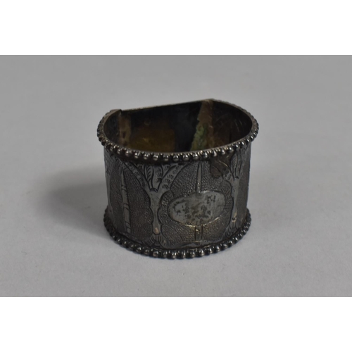 426 - An Indian White Metal Napkin Ring Decorated with Foliate Motif, 19.3g