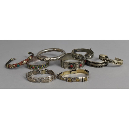 466 - A Collection of Various Indian and Other Silver and White Metal Bangles