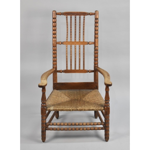 550 - A 19th Century Armchair with Bobbin Back, Cane Seat