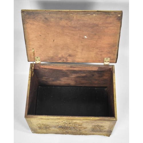 64 - A Mid 20th Century Brass Mounted Coal/Slipper Box with Hand Beaten Ship Design, 41cms Wide