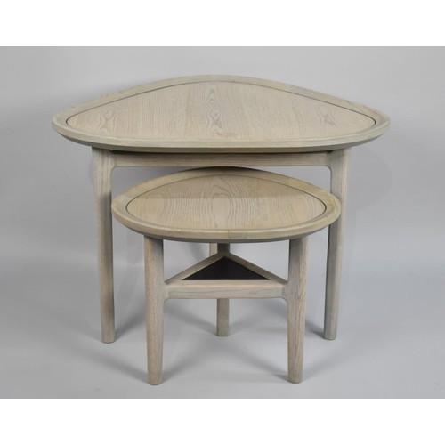 554 - A Nest of Two Winsor Austrian Oak Pebble Shaped Tables, Grey Oil Finish