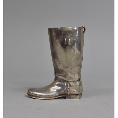 103 - A Novelty Silver Plated Spirit Measure in the Form of a Riding Boot, 9cms High