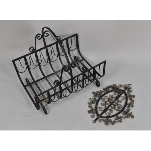 233 - A Modern Wrought Iron Log Basket with Scrolled Feet, 49cm Long Together with a Wrought Iron Wall Han... 