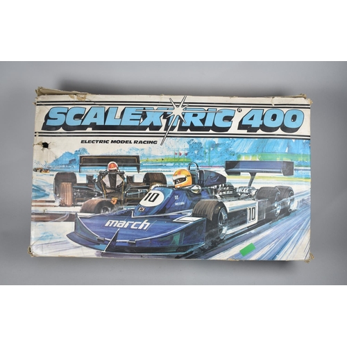 249 - A Vintage Scalextric 400 Model Racing Game Together with Four Extra Cars, Unchecked