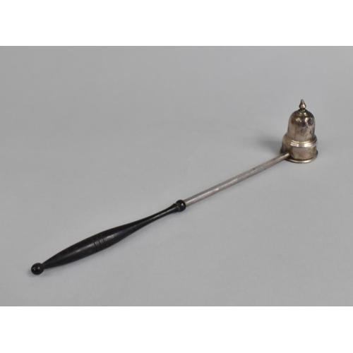 423 - A Sterling Silverand Ebony Handled Candle Snuff