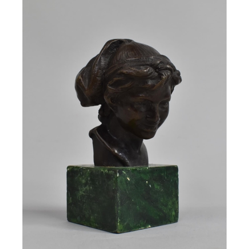 427 - A Reproduction Bronze Bust of Peter Pan on Marble Plinth, 12cm high