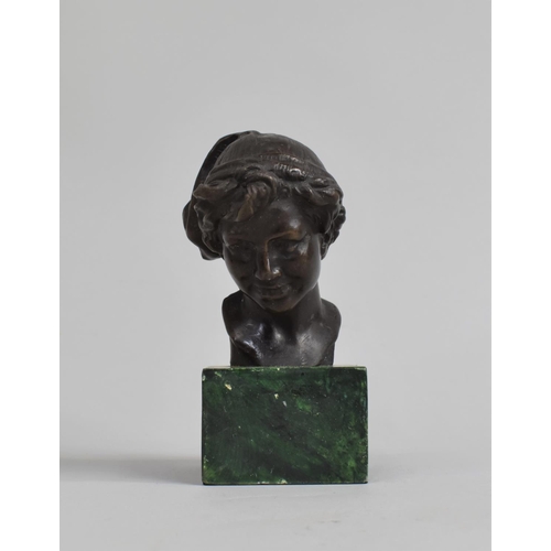 427 - A Reproduction Bronze Bust of Peter Pan on Marble Plinth, 12cm high