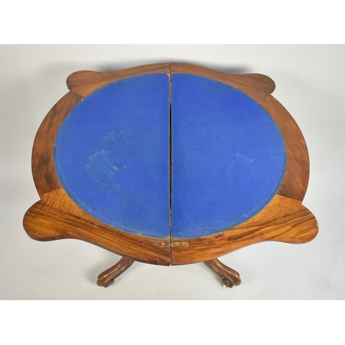 524 - A 19th Century Burr Walnut Lift and Twist Top Games Table on Four Scrolled Supports, Water Damaged T... 