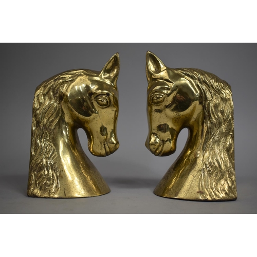 92 - A Pair of Modern Brass Bookends in the form of Horses Heads, 18cms High