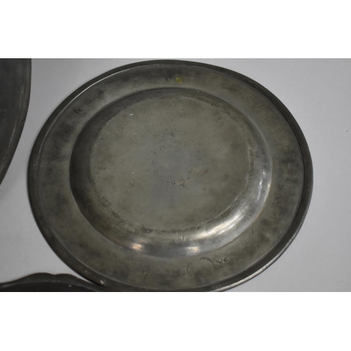 94 - An Early Pewter Charger, Three Various Plates, All with Touch Marks