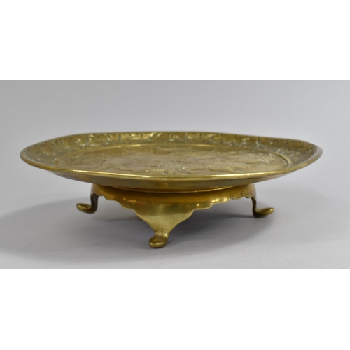 96 - A Heavy Victorian Brass Circular Stand Decorated in Relief with Birds and Brambles, 25.5cms Diameter